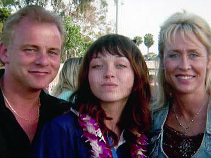 Photo of Nikki Catsoura with her parents.